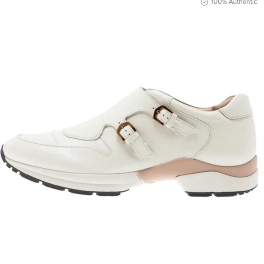 Tod’s leather sneaker with gold buckle detail